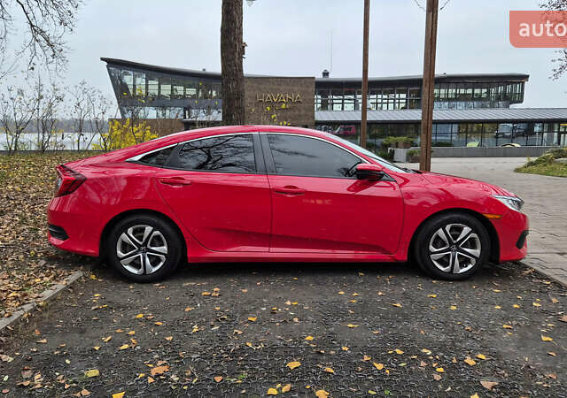 Красный Хонда Цивик, объемом двигателя 2 л и пробегом 119 тыс. км за 14400 $, фото 6 на Automoto.ua