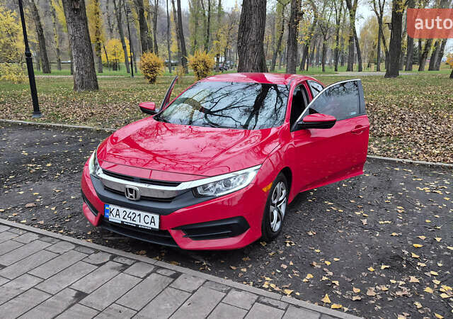 Красный Хонда Цивик, объемом двигателя 2 л и пробегом 119 тыс. км за 14400 $, фото 1 на Automoto.ua