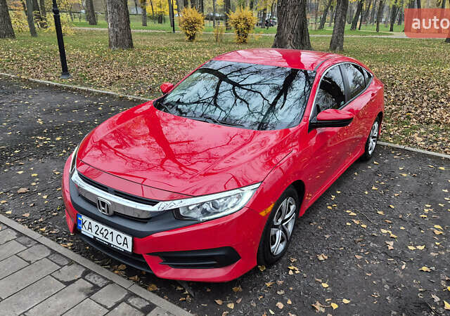 Красный Хонда Цивик, объемом двигателя 2 л и пробегом 119 тыс. км за 14400 $, фото 2 на Automoto.ua