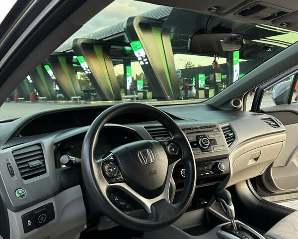 Хонда Цивик, объемом двигателя 1.8 л и пробегом 137 тыс. км за 9400 $, фото 6 на Automoto.ua