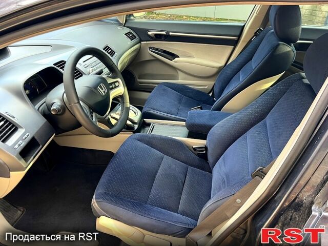 Хонда Цивик, объемом двигателя 1.3 л и пробегом 166 тыс. км за 5499 $, фото 9 на Automoto.ua