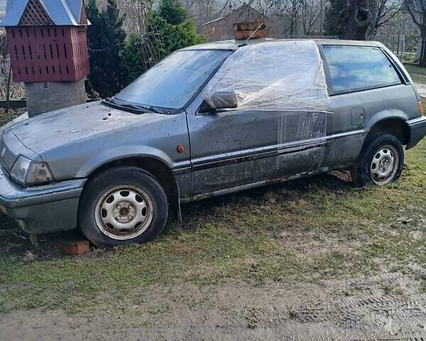 Серый Хонда Цивик, объемом двигателя 1.5 л и пробегом 200 тыс. км за 700 $, фото 3 на Automoto.ua