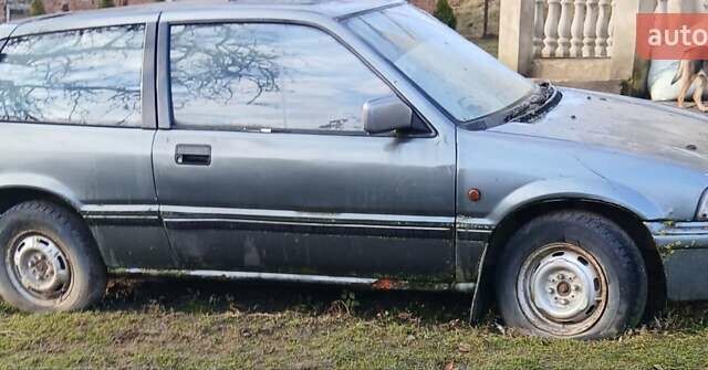 Серый Хонда Цивик, объемом двигателя 1.5 л и пробегом 200 тыс. км за 700 $, фото 1 на Automoto.ua