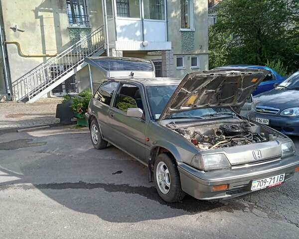 Серый Хонда Цивик, объемом двигателя 1.4 л и пробегом 300 тыс. км за 1399 $, фото 17 на Automoto.ua