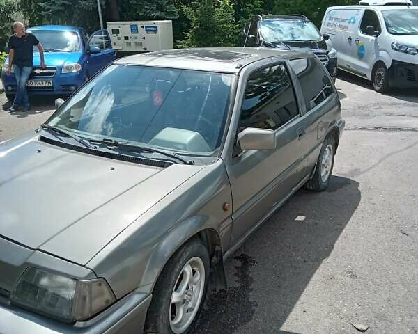 Серый Хонда Цивик, объемом двигателя 1.4 л и пробегом 300 тыс. км за 1399 $, фото 5 на Automoto.ua