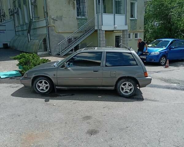 Серый Хонда Цивик, объемом двигателя 1.4 л и пробегом 300 тыс. км за 1399 $, фото 6 на Automoto.ua