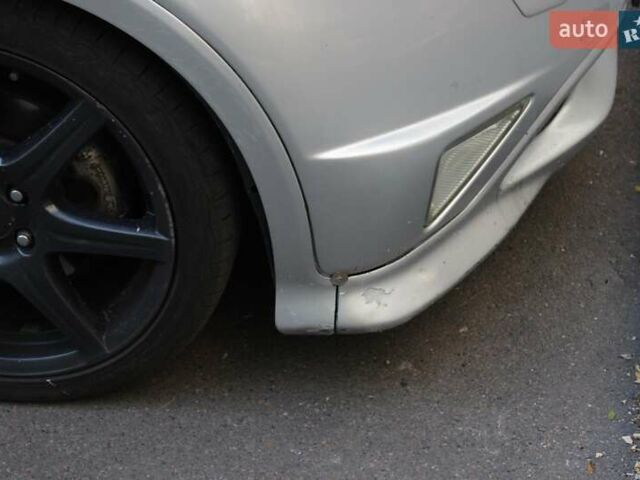 Серый Хонда Цивик, объемом двигателя 2 л и пробегом 251 тыс. км за 5700 $, фото 42 на Automoto.ua