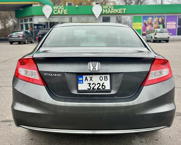 Серый Хонда Цивик, объемом двигателя 1.8 л и пробегом 215 тыс. км за 8300 $, фото 1 на Automoto.ua