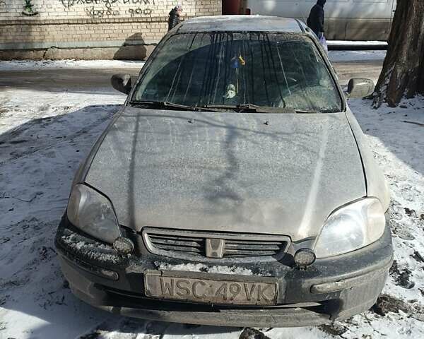 Серый Хонда Цивик, объемом двигателя 1.4 л и пробегом 285 тыс. км за 1500 $, фото 8 на Automoto.ua