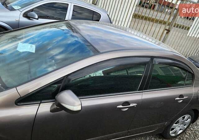 Хонда Цивик 2011 в Хмельницком на Automoto.ua Серый Хонда Цивик, объемом двигателя 1.8 л и пробегом 123 тыс. км за 7700 $, фото 2 на Automoto.ua