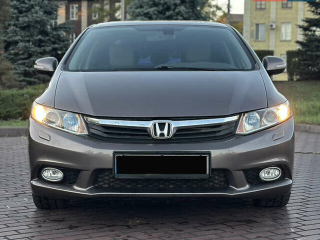 Хонда Цивик 2012 в Днепре (Днепропетровске) на Automoto.ua Серый Хонда Цивик, объемом двигателя 1.8 л и пробегом 225 тыс. км за 9500 $, фото 4 на Automoto.ua
