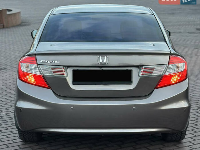 Серый Хонда Цивик, объемом двигателя 1.8 л и пробегом 226 тыс. км за 9500 $, фото 12 на Automoto.ua