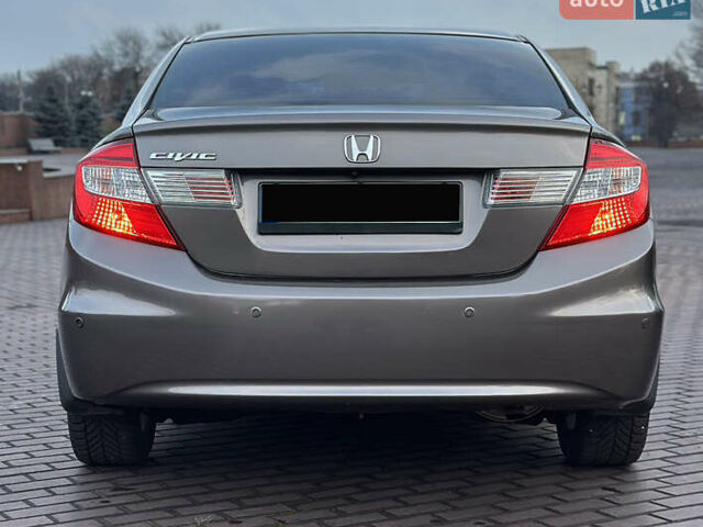 Серый Хонда Цивик, объемом двигателя 1.8 л и пробегом 226 тыс. км за 9500 $, фото 11 на Automoto.ua