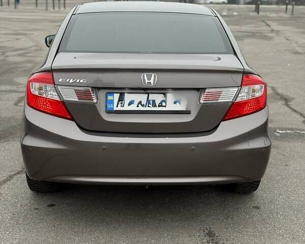 Серый Хонда Цивик, объемом двигателя 1.8 л и пробегом 165 тыс. км за 12500 $, фото 1 на Automoto.ua