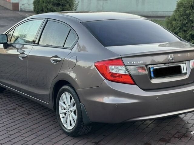 Серый Хонда Цивик, объемом двигателя 1.8 л и пробегом 225 тыс. км за 9200 $, фото 5 на Automoto.ua