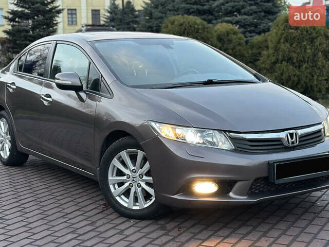 Серый Хонда Цивик, объемом двигателя 1.8 л и пробегом 226 тыс. км за 9500 $, фото 7 на Automoto.ua