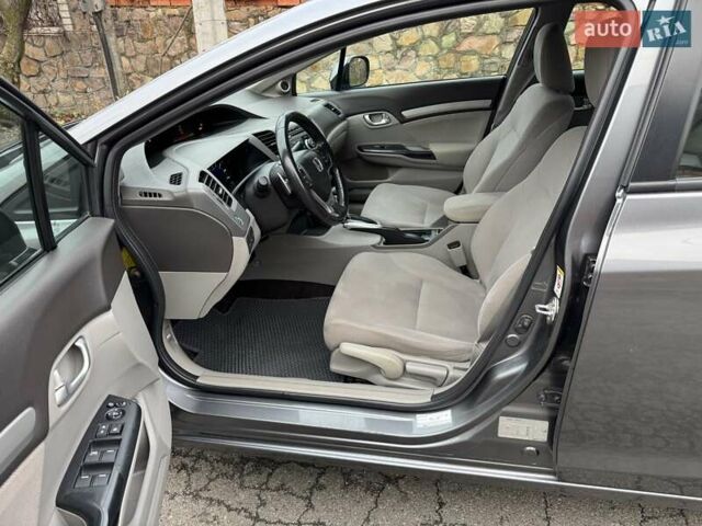 Серый Хонда Цивик, объемом двигателя 1.8 л и пробегом 94 тыс. км за 11900 $, фото 28 на Automoto.ua