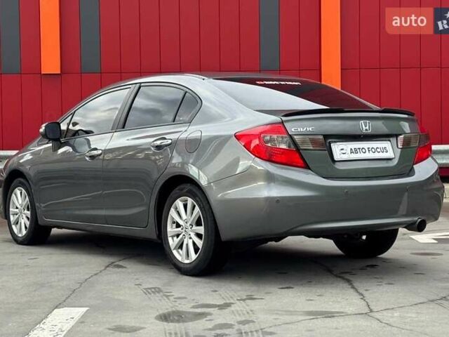 Сірий Хонда Сівік, об'ємом двигуна 1.8 л та пробігом 274 тис. км за 6990 $, фото 4 на Automoto.ua