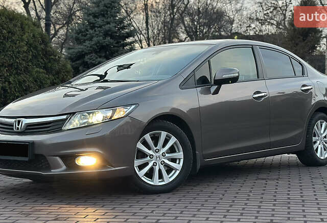 Серый Хонда Цивик, объемом двигателя 1.8 л и пробегом 226 тыс. км за 9500 $, фото 3 на Automoto.ua