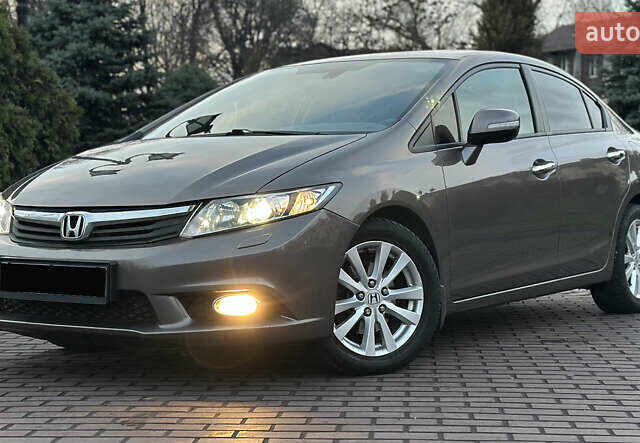 Серый Хонда Цивик, объемом двигателя 1.8 л и пробегом 226 тыс. км за 9500 $, фото 1 на Automoto.ua