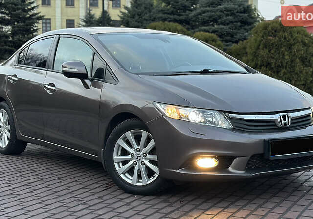 Серый Хонда Цивик, объемом двигателя 1.8 л и пробегом 226 тыс. км за 9500 $, фото 8 на Automoto.ua