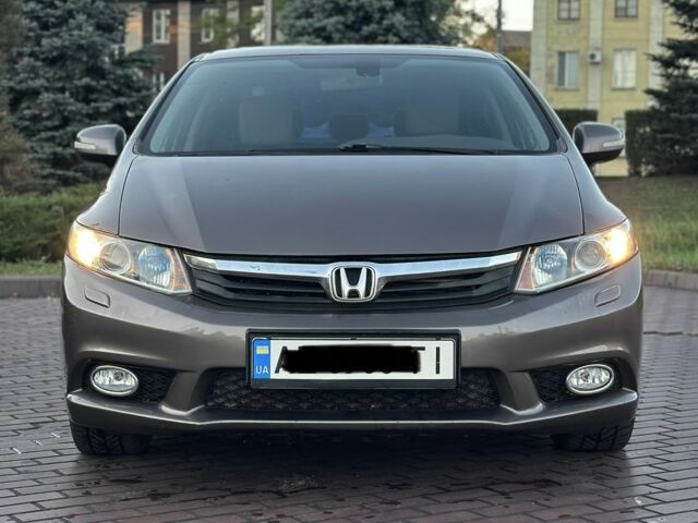 Хонда Цивик 2012 в Днепре (Днепропетровске) на Automoto.ua Серый Хонда Цивик, объемом двигателя 1.8 л и пробегом 225 тыс. км за 9500 $, фото 1 на Automoto.ua