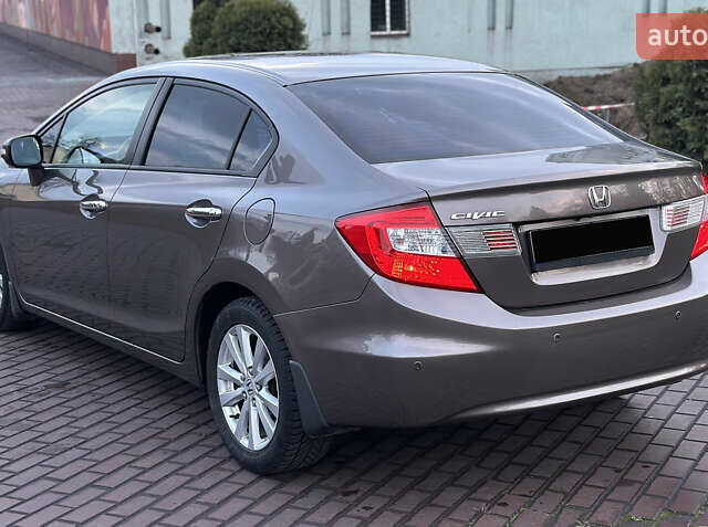 Серый Хонда Цивик, объемом двигателя 1.8 л и пробегом 226 тыс. км за 9500 $, фото 13 на Automoto.ua