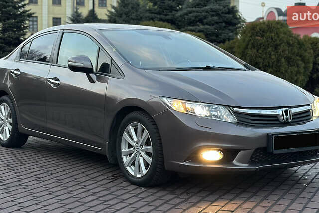 Серый Хонда Цивик, объемом двигателя 1.8 л и пробегом 226 тыс. км за 9500 $, фото 9 на Automoto.ua