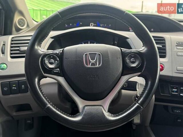 Хонда Цивик 2012 в Киеве на Automoto.ua Серый Хонда Цивик, объемом двигателя 1.8 л и пробегом 274 тыс. км за 8690 $, фото 14 на Automoto.ua