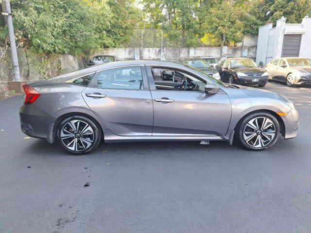 Серый Хонда Цивик, объемом двигателя 1.5 л и пробегом 74 тыс. км за 6900 $, фото 6 на Automoto.ua