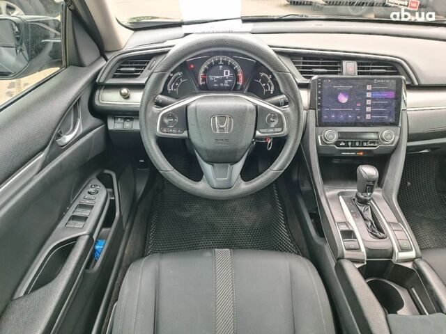 Серый Хонда Цивик, объемом двигателя 2 л и пробегом 151 тыс. км за 12290 $, фото 14 на Automoto.ua