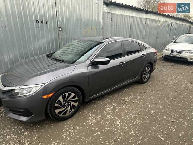 Серый Хонда Цивик, объемом двигателя 2 л и пробегом 105 тыс. км за 13200 $, фото 51 на Automoto.ua