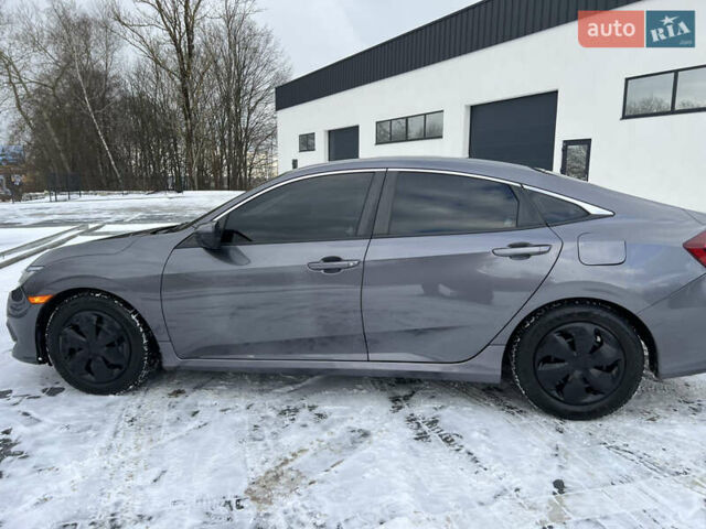 Серый Хонда Цивик, объемом двигателя 2 л и пробегом 199 тыс. км за 12600 $, фото 6 на Automoto.ua