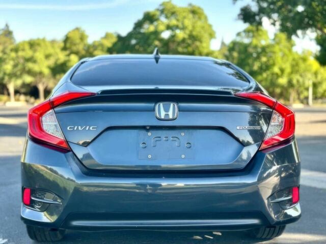 Серый Хонда Цивик, объемом двигателя 1.5 л и пробегом 57 тыс. км за 12650 $, фото 3 на Automoto.ua