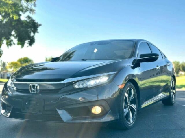 Серый Хонда Цивик, объемом двигателя 1.5 л и пробегом 57 тыс. км за 12650 $, фото 1 на Automoto.ua