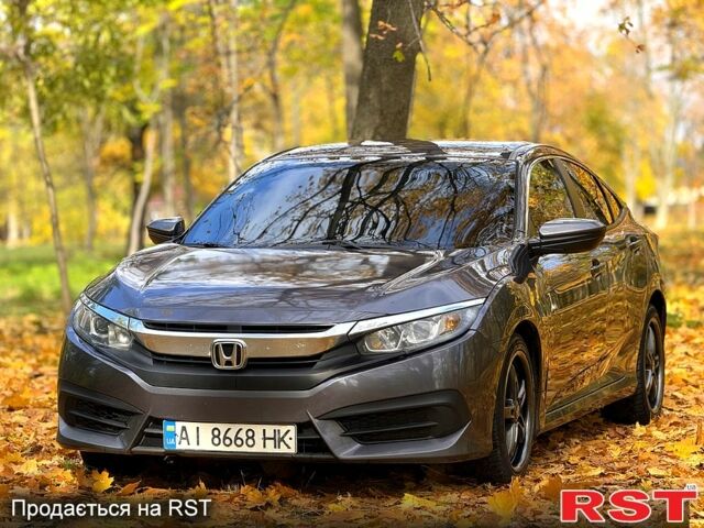 Серый Хонда Цивик, объемом двигателя 2 л и пробегом 117 тыс. км за 13750 $, фото 2 на Automoto.ua