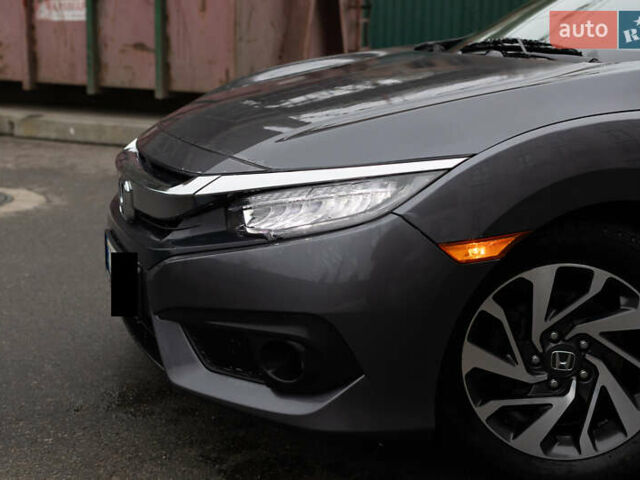 Сірий Хонда Сівік, об'ємом двигуна 2 л та пробігом 91 тис. км за 14499 $, фото 2 на Automoto.ua