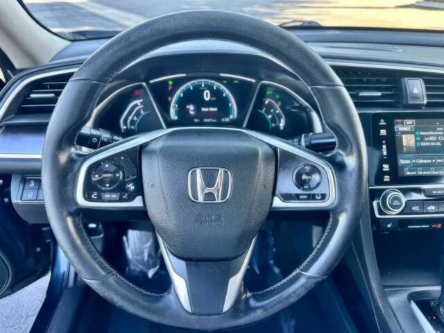 Серый Хонда Цивик, объемом двигателя 1.5 л и пробегом 57 тыс. км за 12650 $, фото 8 на Automoto.ua