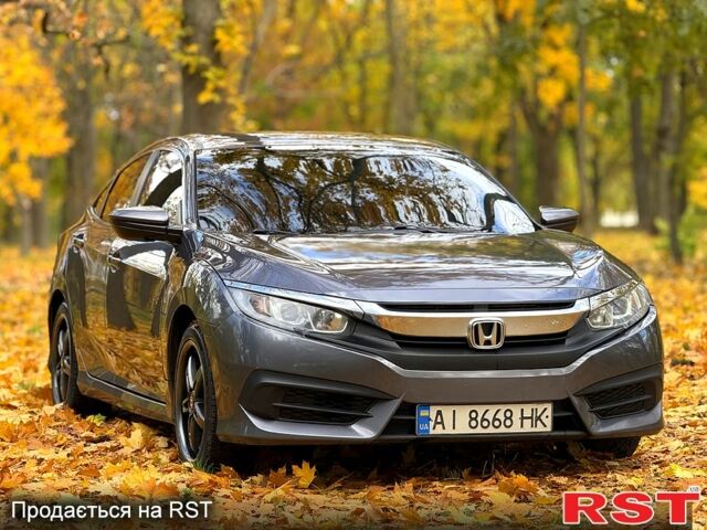 Серый Хонда Цивик, объемом двигателя 2 л и пробегом 117 тыс. км за 13750 $, фото 1 на Automoto.ua
