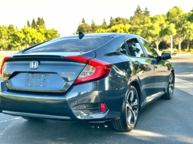 Серый Хонда Цивик, объемом двигателя 1.5 л и пробегом 57 тыс. км за 12650 $, фото 4 на Automoto.ua