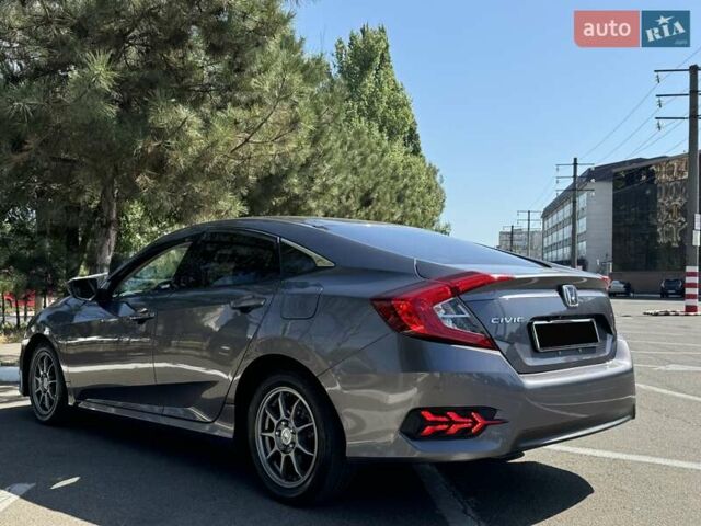 Сірий Хонда Сівік, об'ємом двигуна 2 л та пробігом 90 тис. км за 13799 $, фото 6 на Automoto.ua