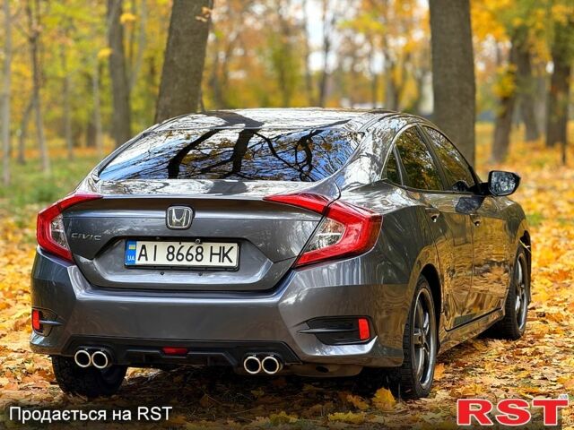 Серый Хонда Цивик, объемом двигателя 2 л и пробегом 117 тыс. км за 13750 $, фото 5 на Automoto.ua
