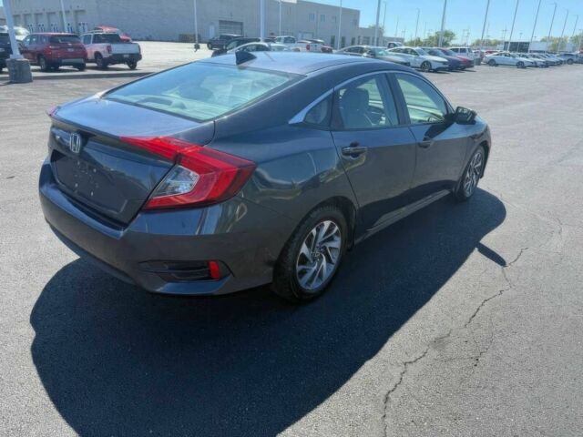 Серый Хонда Цивик, объемом двигателя 2 л и пробегом 34 тыс. км за 8700 $, фото 4 на Automoto.ua