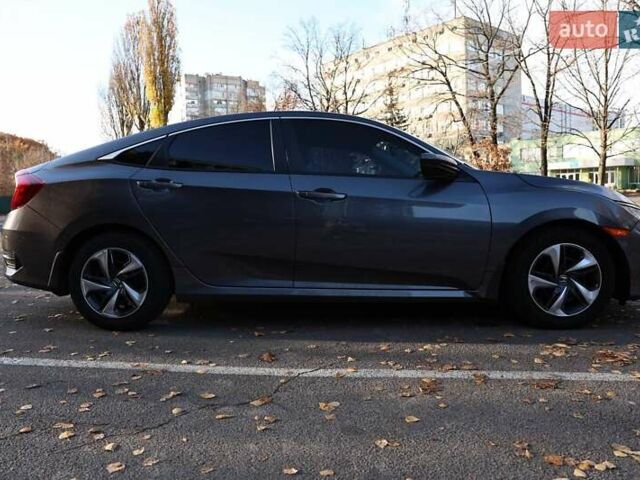 Серый Хонда Цивик, объемом двигателя 2 л и пробегом 80 тыс. км за 14000 $, фото 7 на Automoto.ua