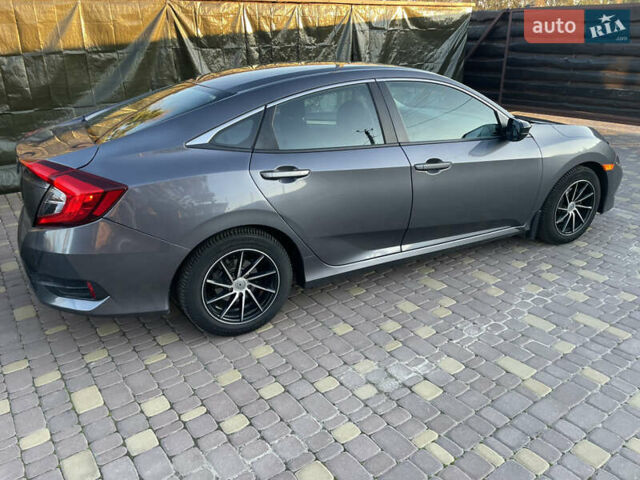 Серый Хонда Цивик, объемом двигателя 2 л и пробегом 90 тыс. км за 17400 $, фото 5 на Automoto.ua