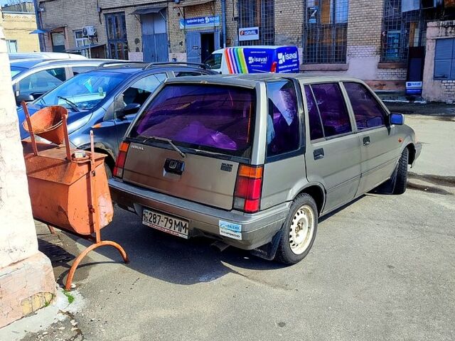 Серый Хонда Цивик, объемом двигателя 1.5 л и пробегом 389 тыс. км за 1100 $, фото 4 на Automoto.ua