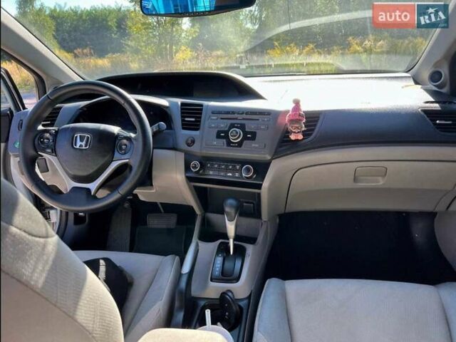 Синий Хонда Цивик, объемом двигателя 1.8 л и пробегом 273 тыс. км за 7499 $, фото 15 на Automoto.ua