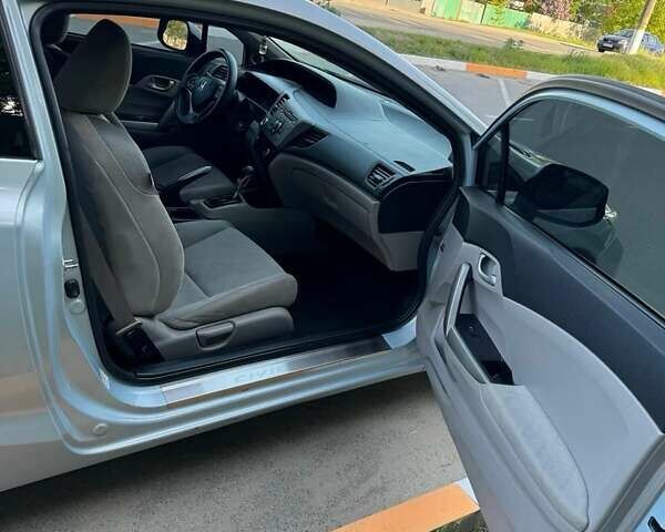 Синий Хонда Цивик, объемом двигателя 1.8 л и пробегом 273 тыс. км за 7499 $, фото 18 на Automoto.ua