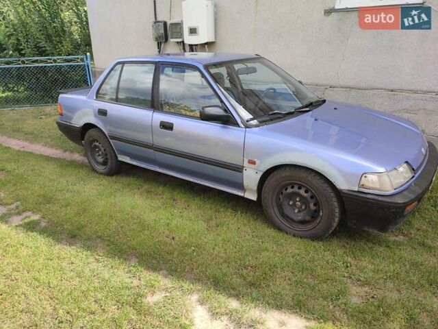 Синий Хонда Цивик, объемом двигателя 1.4 л и пробегом 297 тыс. км за 1700 $, фото 1 на Automoto.ua
