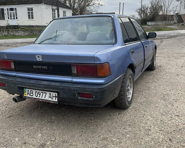 Синий Хонда Цивик, объемом двигателя 1.4 л и пробегом 200 тыс. км за 950 $, фото 3 на Automoto.ua